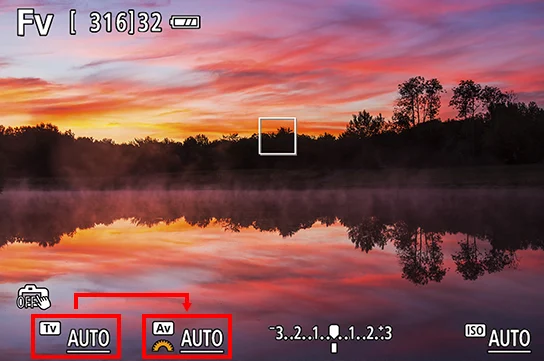 หน้าจอกล้อง Canon ในโหมด Fv ค่าที่เลือกอยู่มีไอคอนแป้นหมุนสีส้มกำกับ