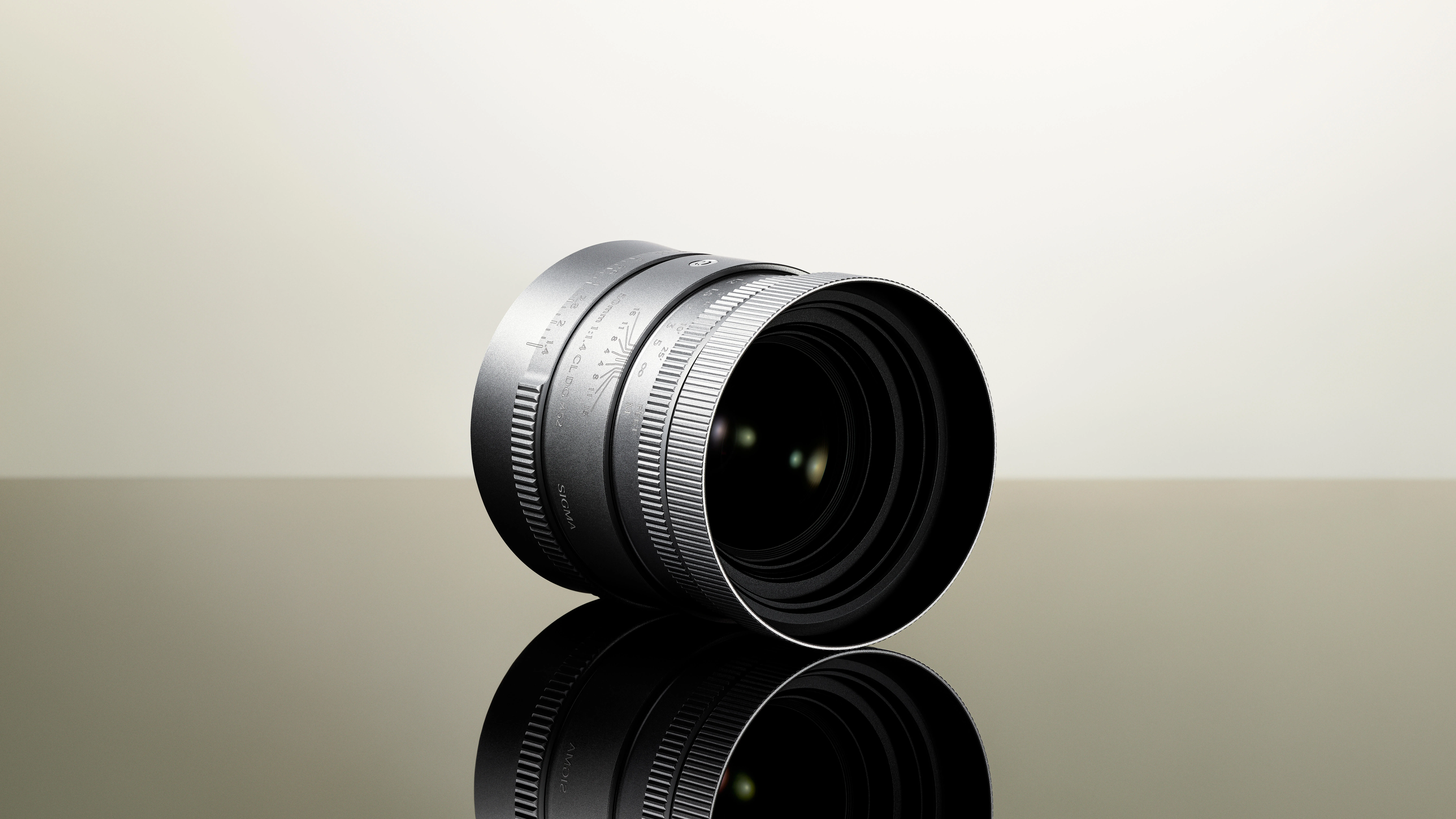 SIGMA 50mm F1.4 CL DG Contemporary เลนส์ 50mm ตัวเล็ก บอดี้โลหะ สีเงิน